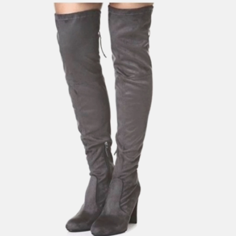 NWOT Beautiful Miim grey boots. Will definitely turn heads.